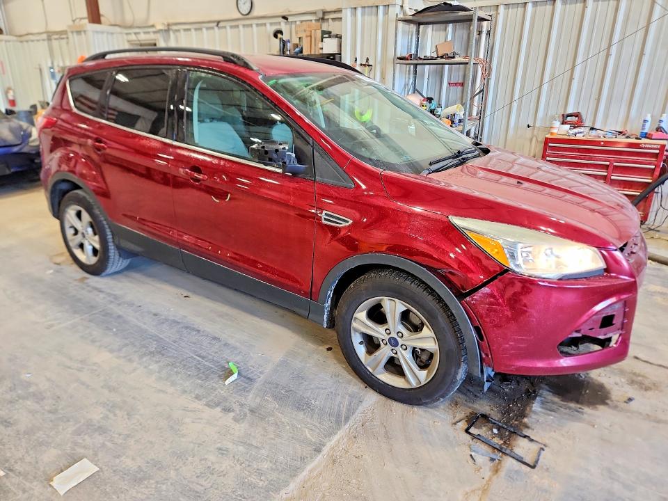 Photo 4 from auction – 2014 FORD ESCAPE with VIN 1FMCU0G99EUC49821