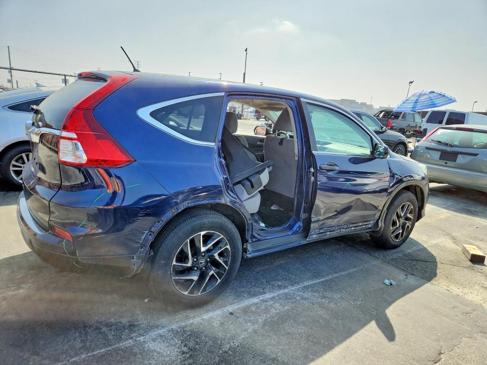 Photo 3 from auction – 2016 HONDA CR-V with VIN 2HKRM3H45GH506439