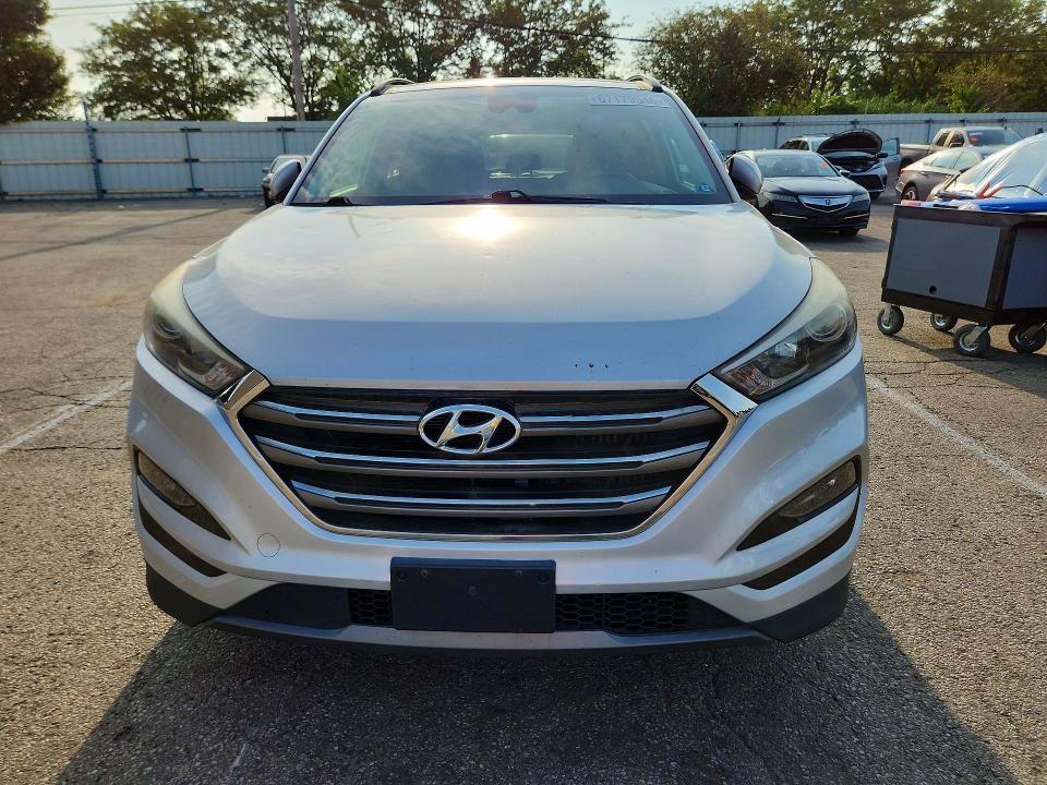 Photo 5 from auction – 2016 HYUNDAI TUCSON with VIN KM8J3CA24GU095075