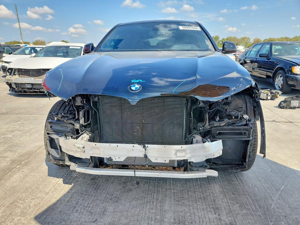 Photo 5 from auction – 2021 BMW X6 with VIN 5UXCY4C02M9G29447