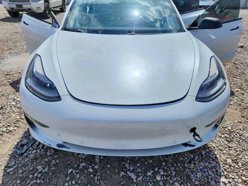 Снимка 11 от търг – 2021 TESLA MODEL 3 с VIN 5YJ3E1EB7MF868969