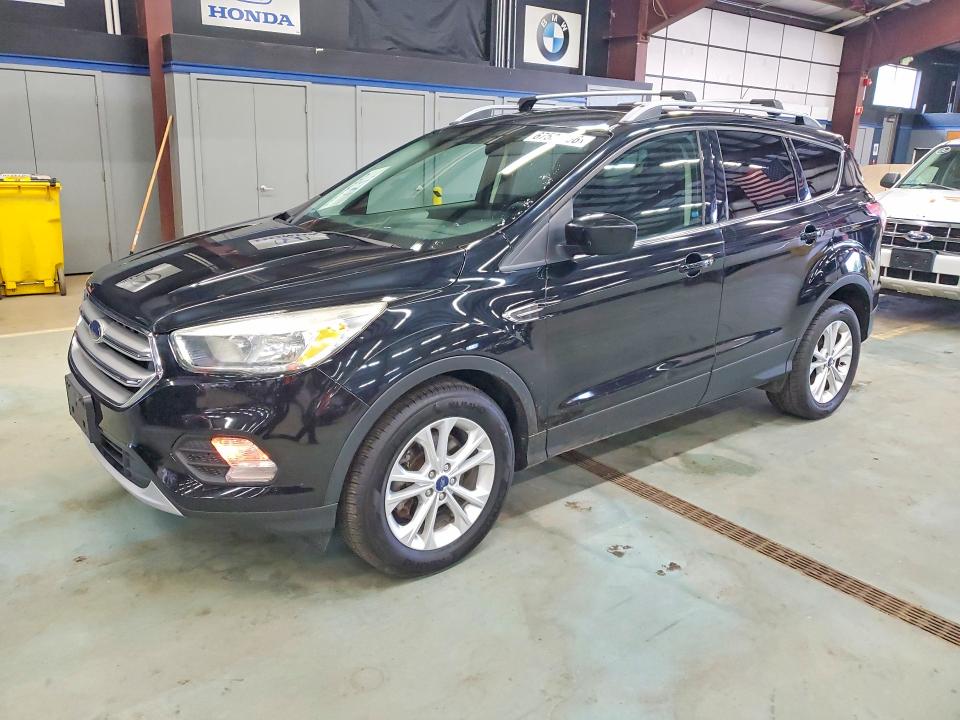 FORD ESCAPE 2017 with VIN 1FMCU9GD2HUF01017 - Photo from auction