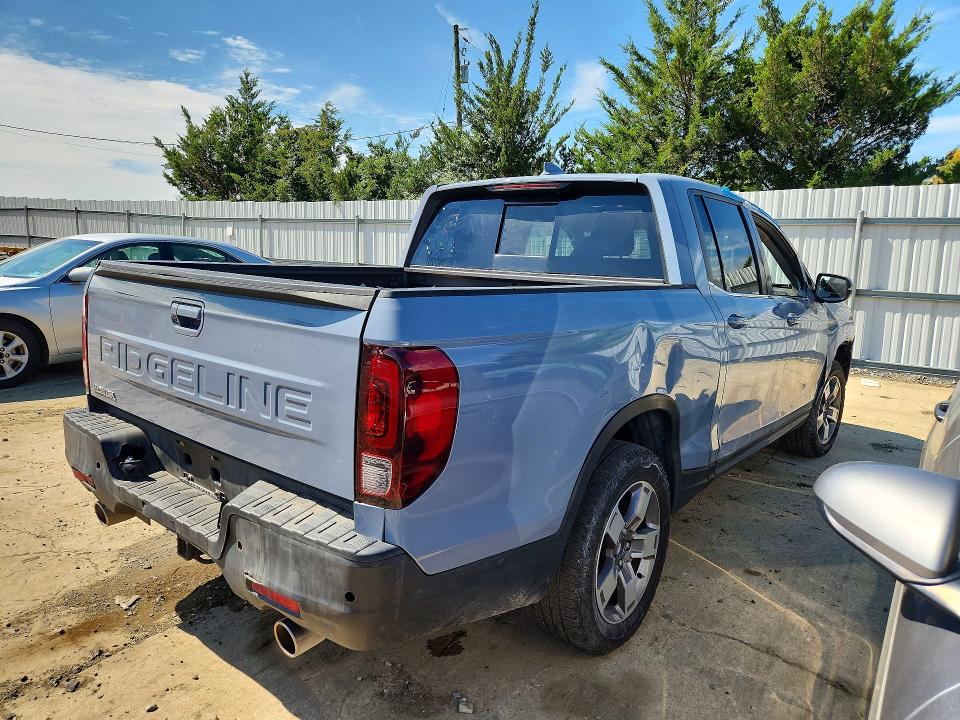Photo 3 from auction – 2024 HONDA RIDGELINE with VIN 5FPYK3F52RB013338