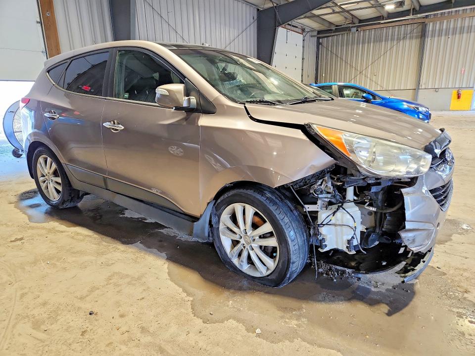Photo 4 from auction – 2012 HYUNDAI TUCSON with VIN KM8JUCAC1CU375682