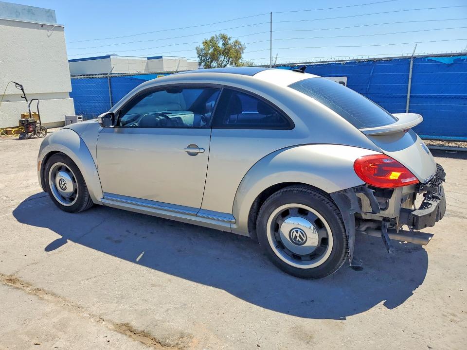 Photo 2 from auction – 2013 VOLKSWAGEN BEETLE with VIN 3VWJP7AT8DM617695