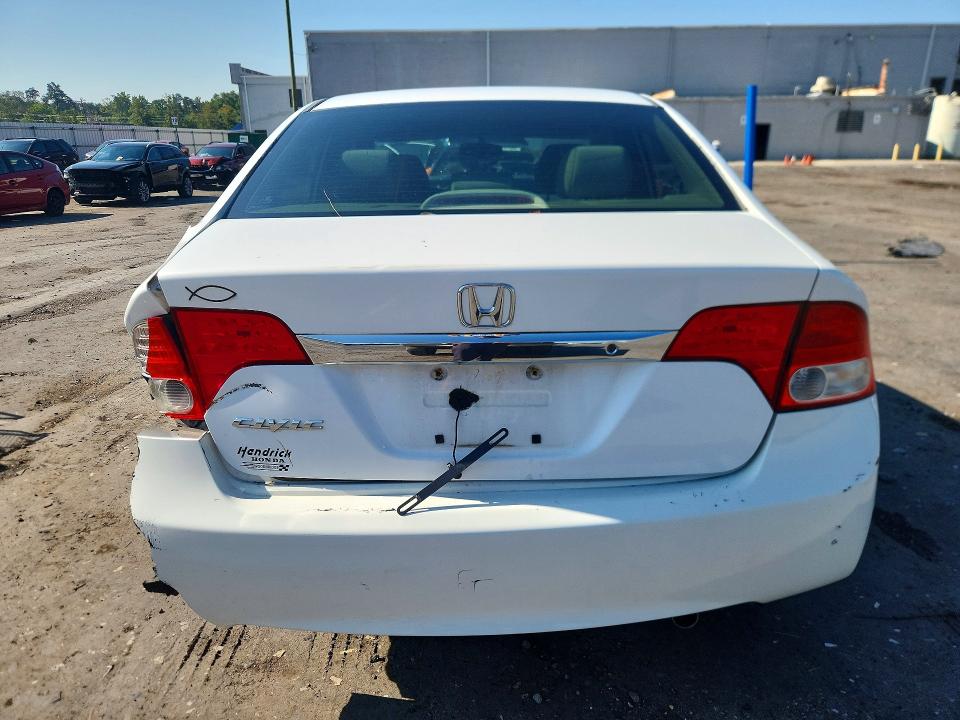 Photo 6 from auction – 2011 HONDA ^CIVIC LX with VIN 19XFA1F52BE035374