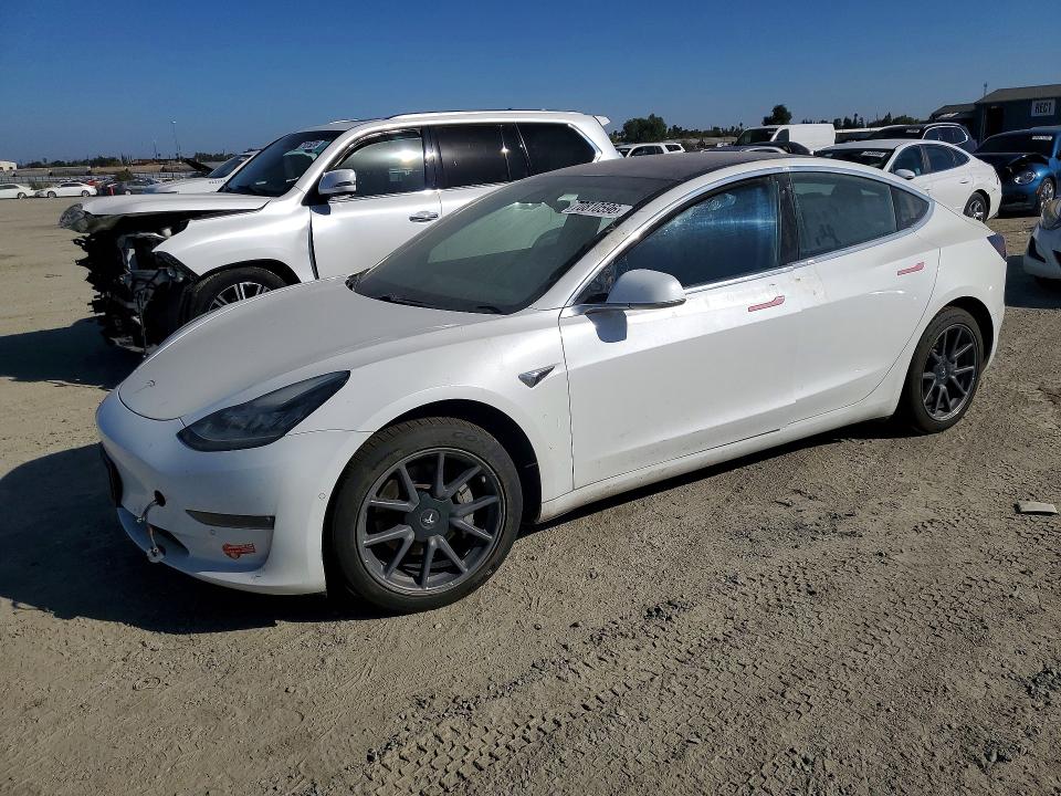 TESLA MODEL 3 2018 z numerem VIN 5YJ3E1EA6JF010623 - Zdjęcie z aukcji