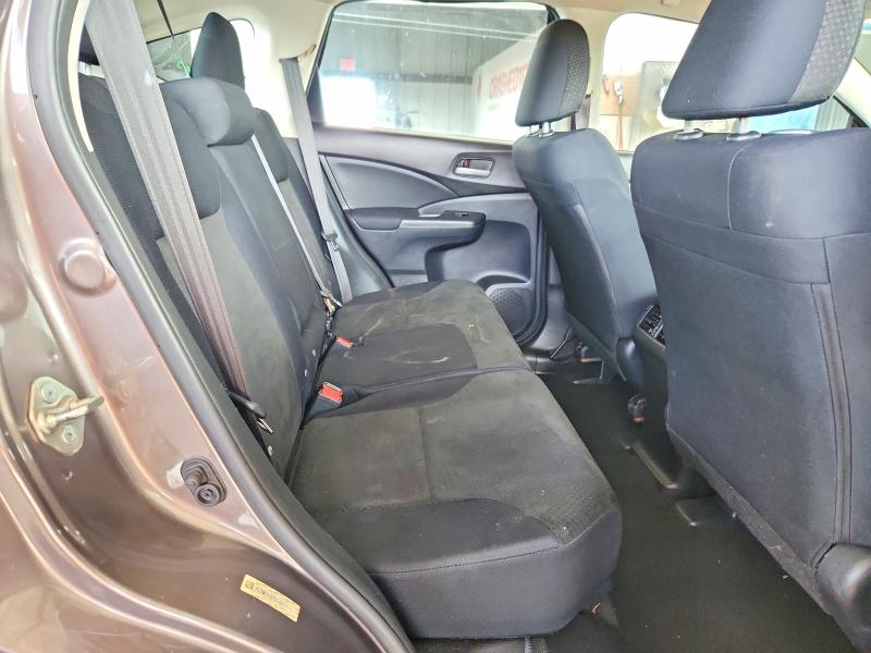 Photo 11 from auction – 2015 HONDA CR-V with VIN 3CZRM3H3XFG700974