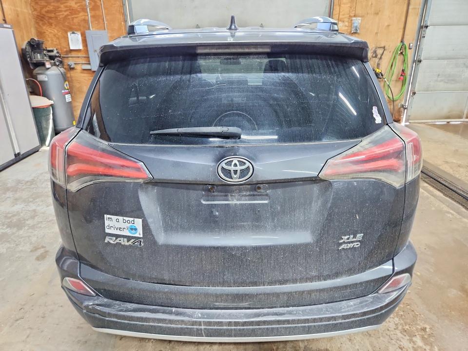 Photo 6 from auction – 2016 TOYOTA RAV4 with VIN 2T3RFREV6GW437764