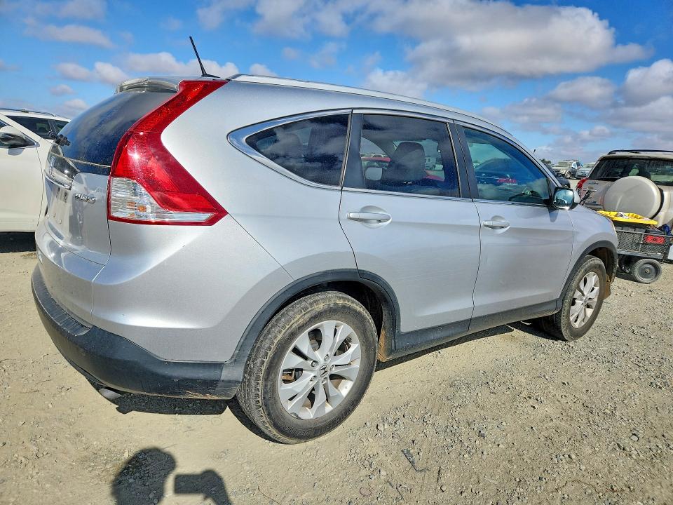 Photo 3 from auction – 2014 HONDA CR-V with VIN 2HKRM4H76EH623332