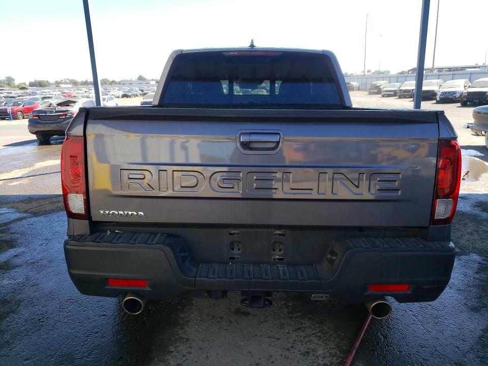Photo 6 from auction – 2025 HONDA RIDGELINE with VIN 5FPYK3F57SB037611