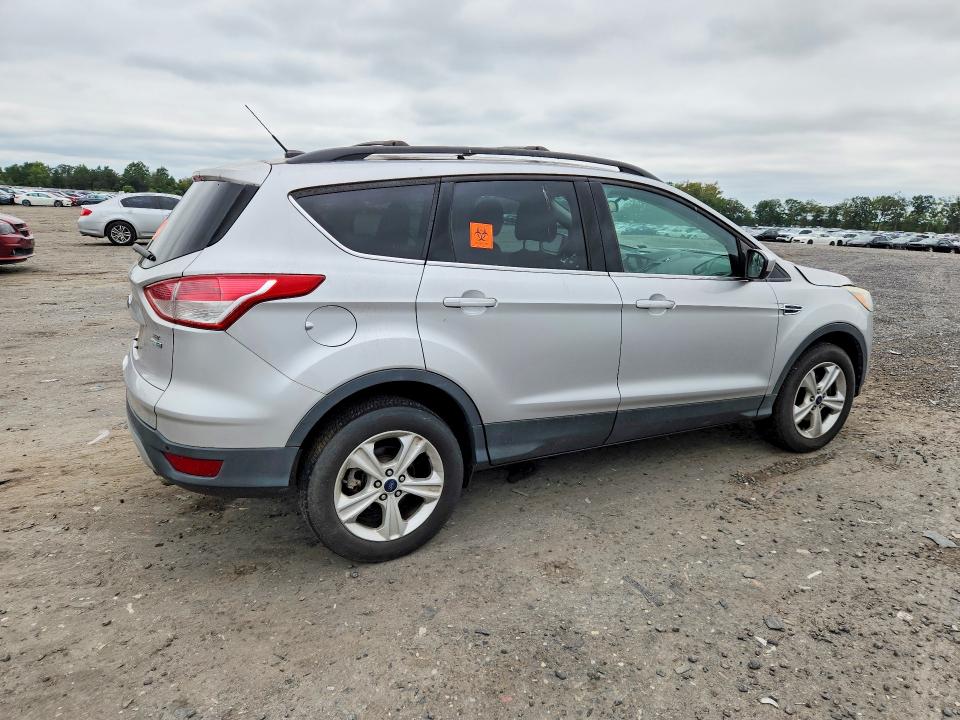 Photo 3 from auction – 2016 FORD ESCAPE with VIN 1FMCU9G92GUC52356