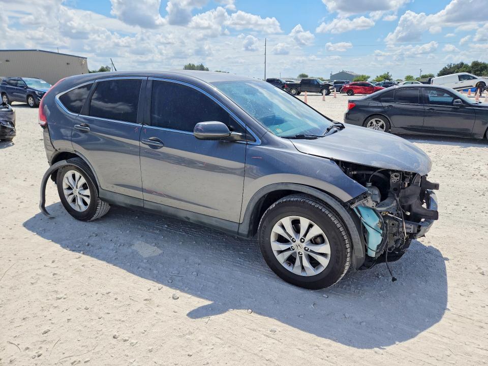 Photo 4 from auction – 2014 HONDA CR-V with VIN 3CZRM3H5XEG702823