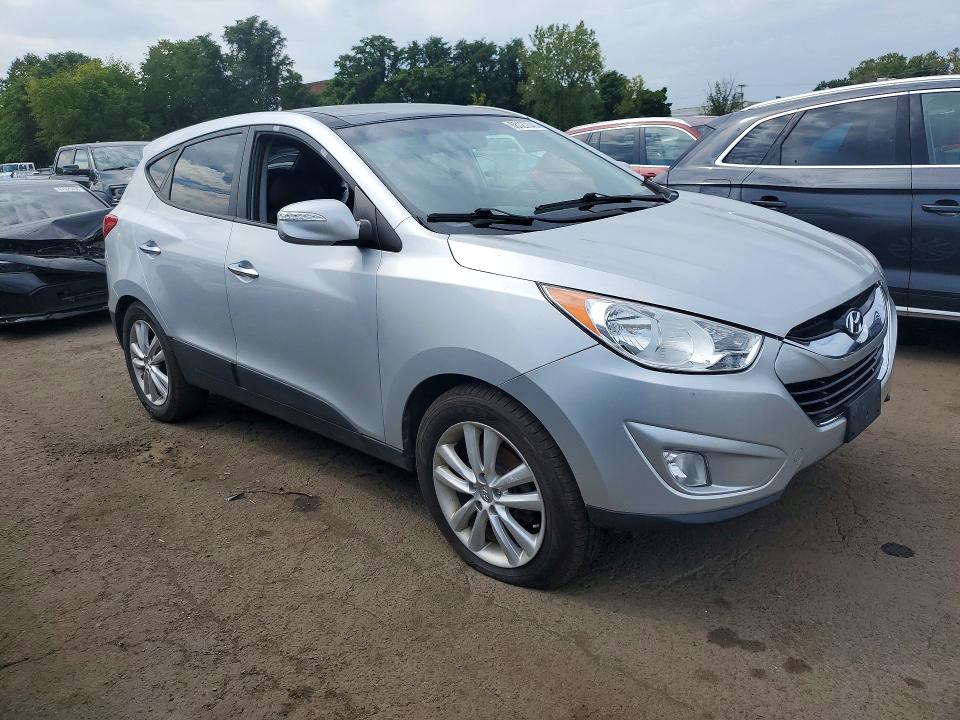 Photo 4 from auction – 2010 HYUNDAI TUCSON with VIN KM8JUCAC3AU024883