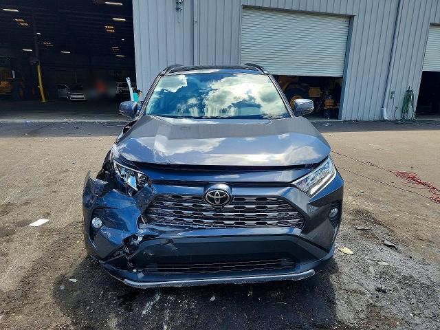 Photo 5 from auction – 2021 TOYOTA RAV4 with VIN JTMY1RFV3MD083574