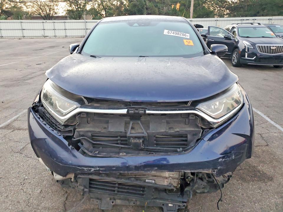 Photo 5 from auction – 2018 HONDA CR-V with VIN 7FARW2H8XJE012370