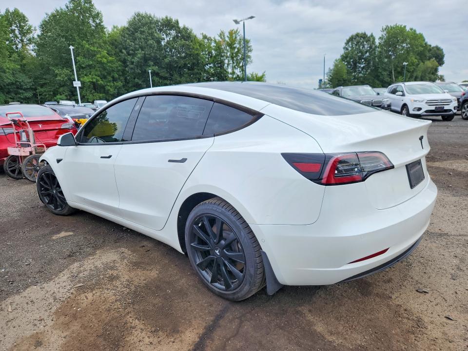 Photo 2 from auction – 2021 TESLA MODEL 3 with VIN 5YJ3E1EA3MF043812