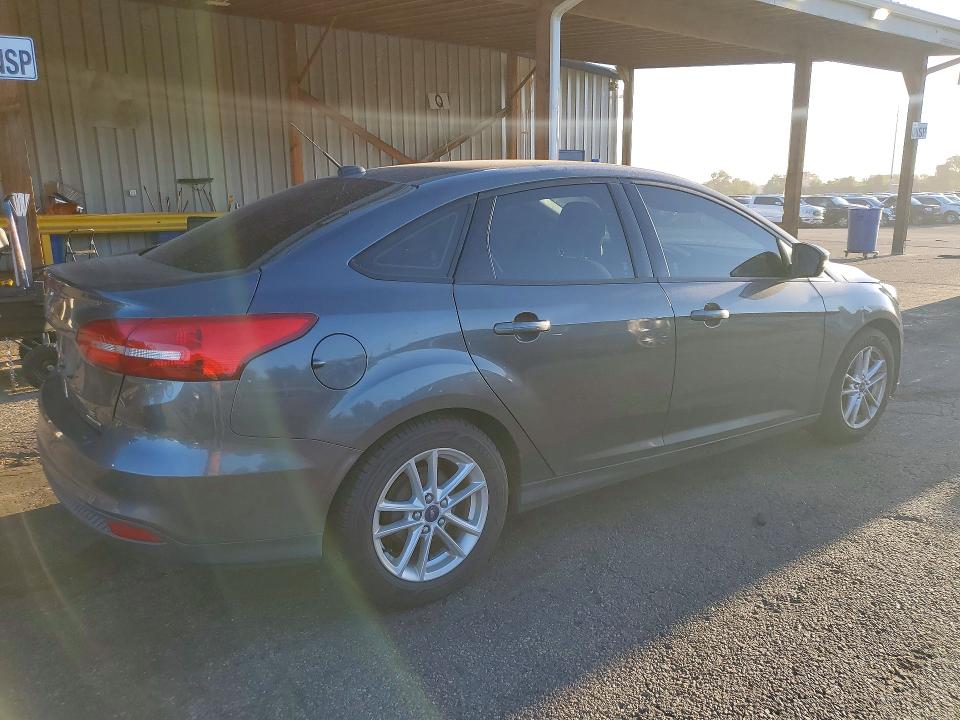 Фото 3 с аукциона – 2016 FORD FOCUS с VIN 1FADP3F28GL386933
