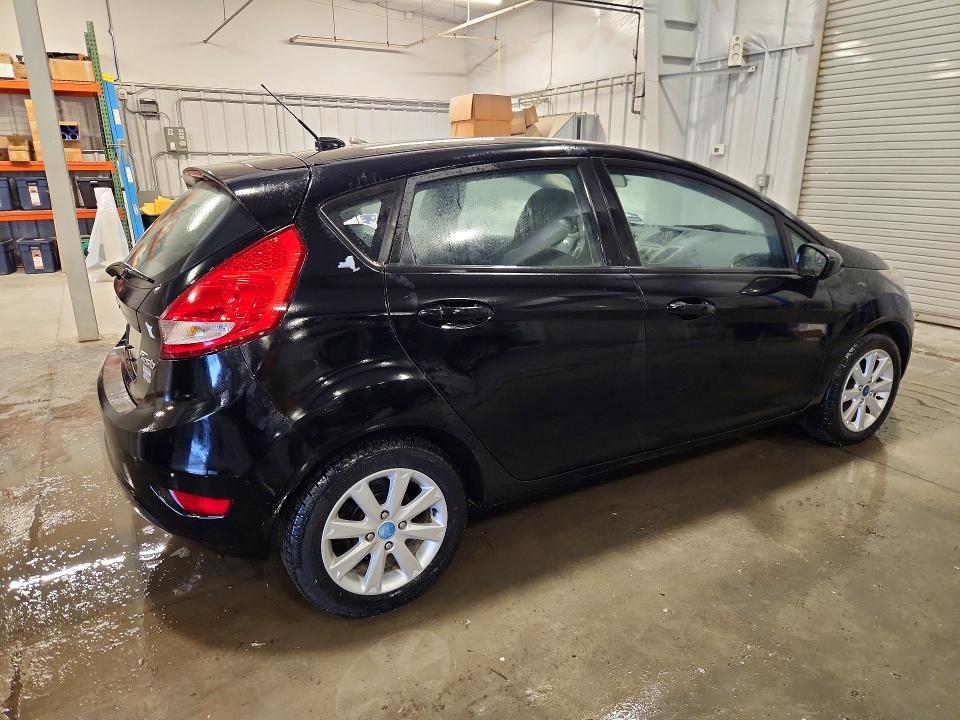 Снимка 3 от търг – 2012 FORD FIESTA с VIN 3FADP4EJ3CM118184
