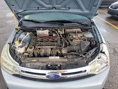 Photo 11 from auction – 2009 FORD FOCUS with VIN 1FAHP35N89W145033