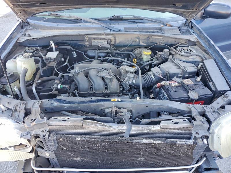 Photo 12 from auction – 2001 FORD ESCAPE with VIN 1FMYU02151KA49077
