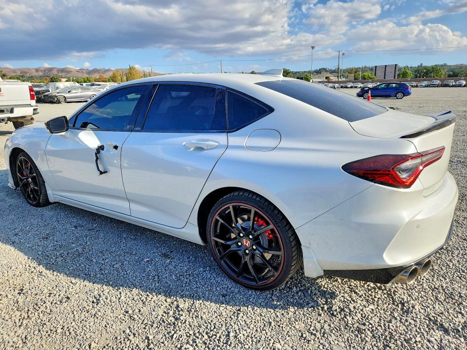 Снимка 2 от търг – 2021 ACURA TLX с VIN 19UUB7F03MA000569