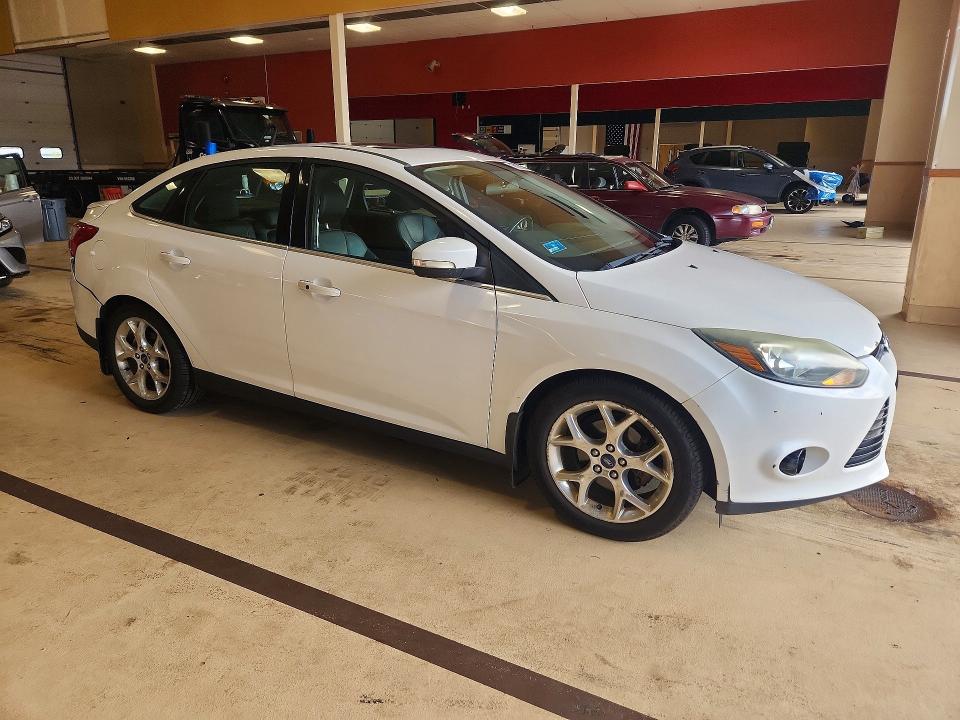 Photo 4 from auction – 2013 FORD FOCUS with VIN 1FADP3J28DL368094