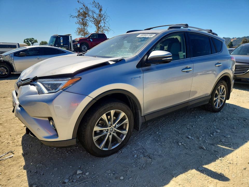 TOYOTA RAV4 HV 2018 with VIN JTMDJREV2JD171737 - Photo from auction