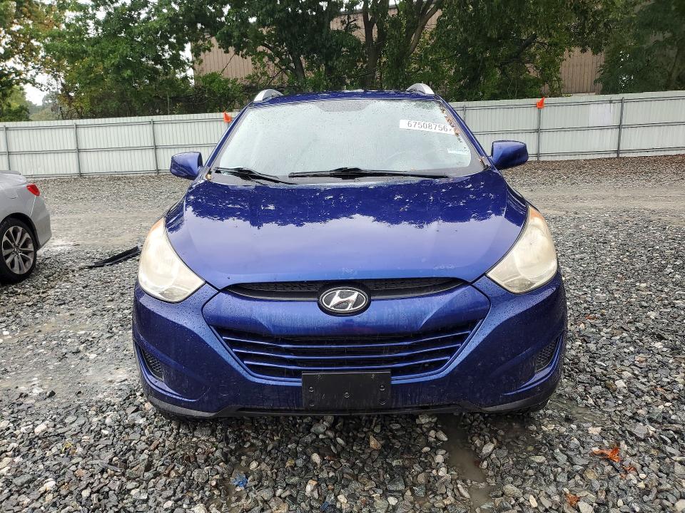 Photo 5 from auction – 2010 HYUNDAI TUCSON with VIN KM8JUCAC6AU081594