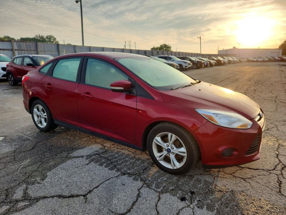Photo 4 from auction – 2014 FORD FOCUS with VIN 1FADP3F29EL439460