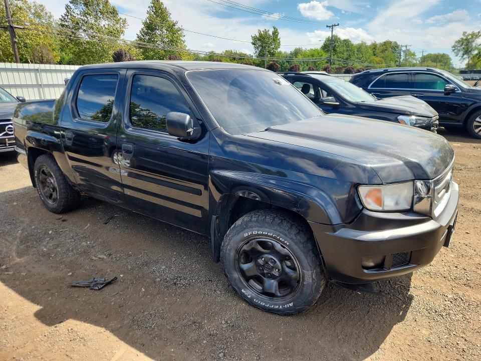 Photo 4 from auction – 2010 HONDA RIDGELINE with VIN 5FPYK1F28AB005193
