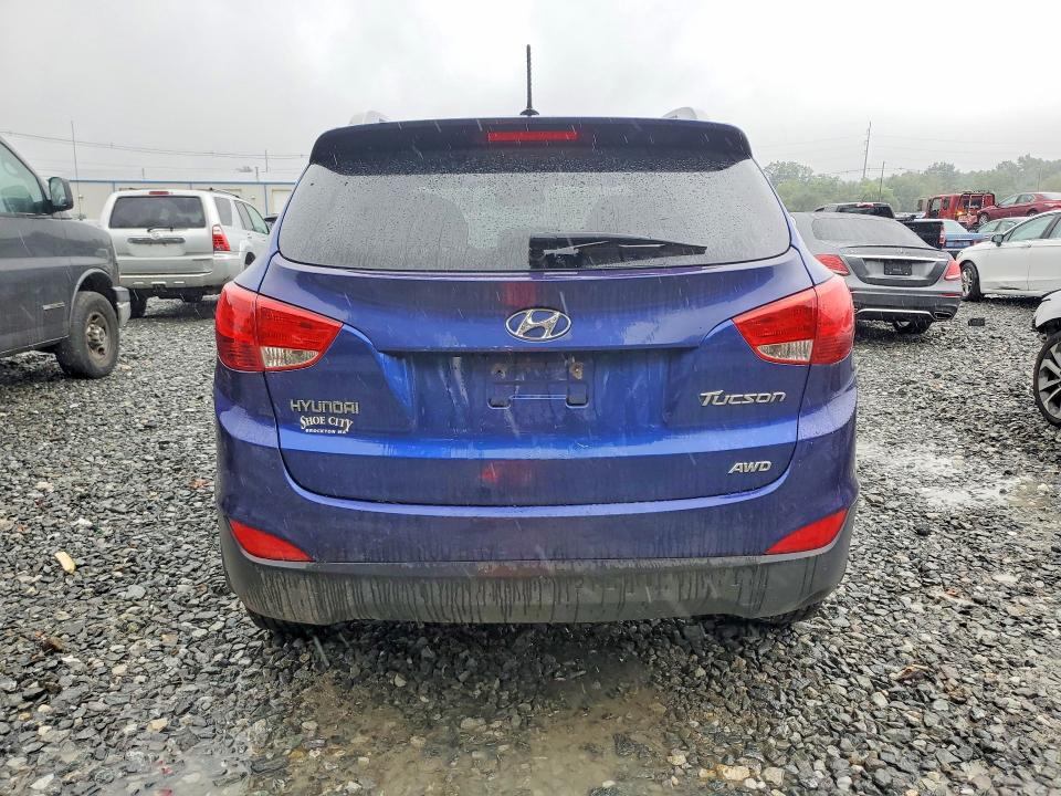 Photo 6 from auction – 2010 HYUNDAI TUCSON with VIN KM8JUCAC6AU081594