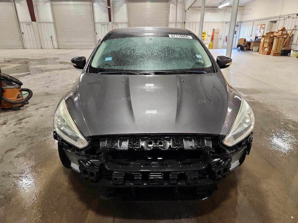 Photo 5 from auction – 2016 FORD FOCUS with VIN 1FADP3F26GL315357