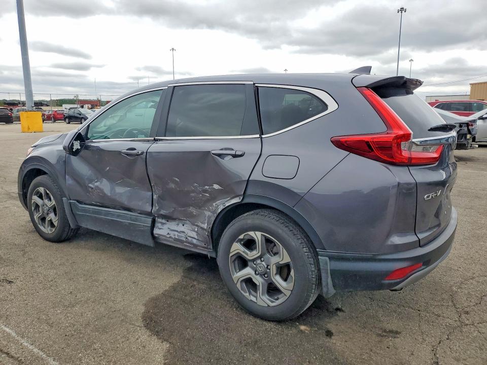 Photo 2 from auction – 2019 HONDA CR-V with VIN 2HKRW2H5XKH674356
