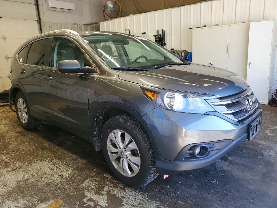 Photo 4 from auction – 2014 HONDA CR-V with VIN 2HKRM3H73EH546283