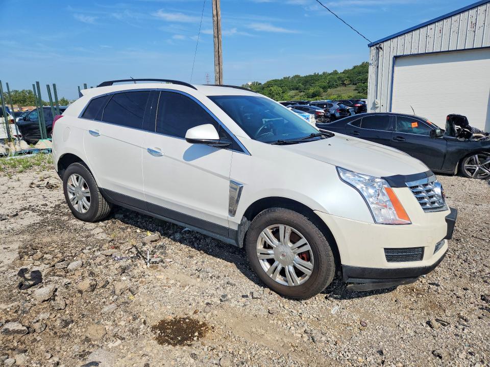 Фото 4 с аукциона – 2014 CADILLAC SRX с VIN 3GYFNAE37ES580734