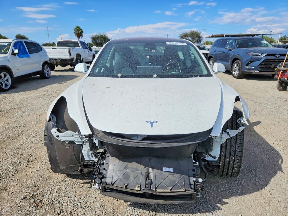 Photo 5 from auction – 2018 TESLA MODEL 3 with VIN 5YJ3E1EA7JF017256