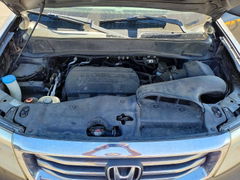 Photo 12 from auction – 2013 HONDA PILOT with VIN 5FNYF4H47DB023542