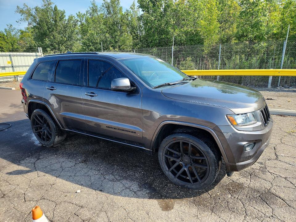 Снимка 4 от търг – 2015 JEEP GRAND CHEROKEE с VIN 1C4RJFAG9FC692494