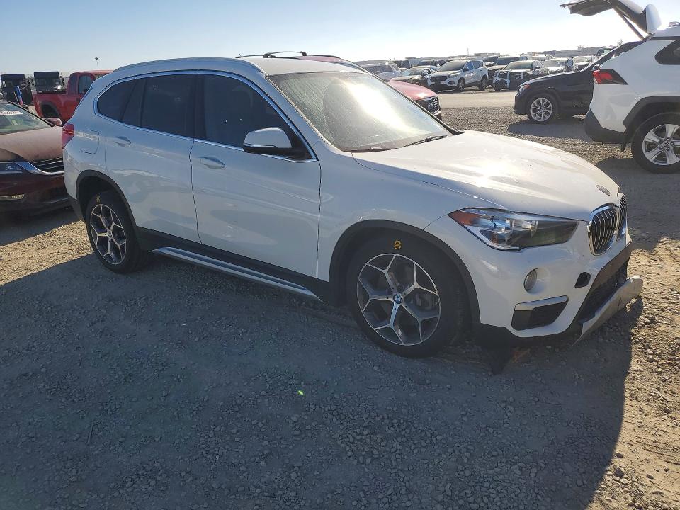 Photo 4 from auction – 2018 BMW X1 with VIN WBXHU7C34J3H43479