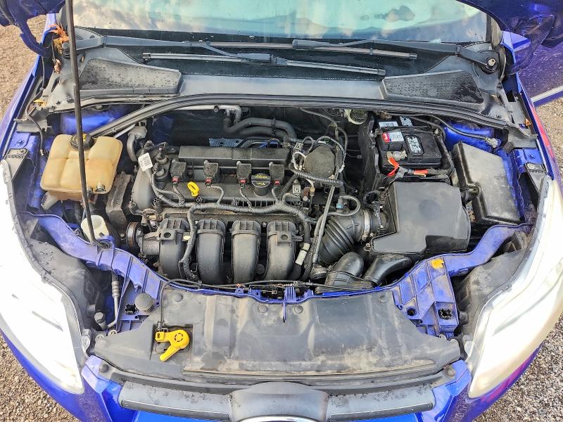 Photo 11 from auction – 2014 FORD FOCUS with VIN 1FADP3F29EL335485