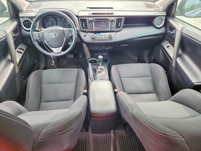 Photo 8 from auction – 2018 TOYOTA RAV4 with VIN 2T3RFREVXJW780231