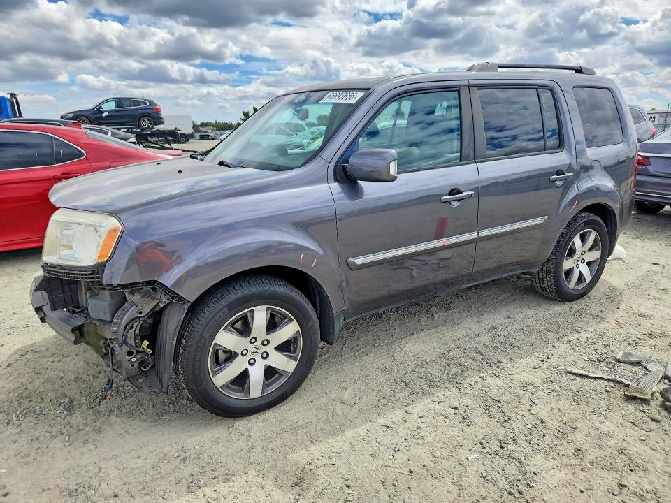 HONDA PILOT 2014 with VIN 5FNYF3H92EB020555 - Photo from auction