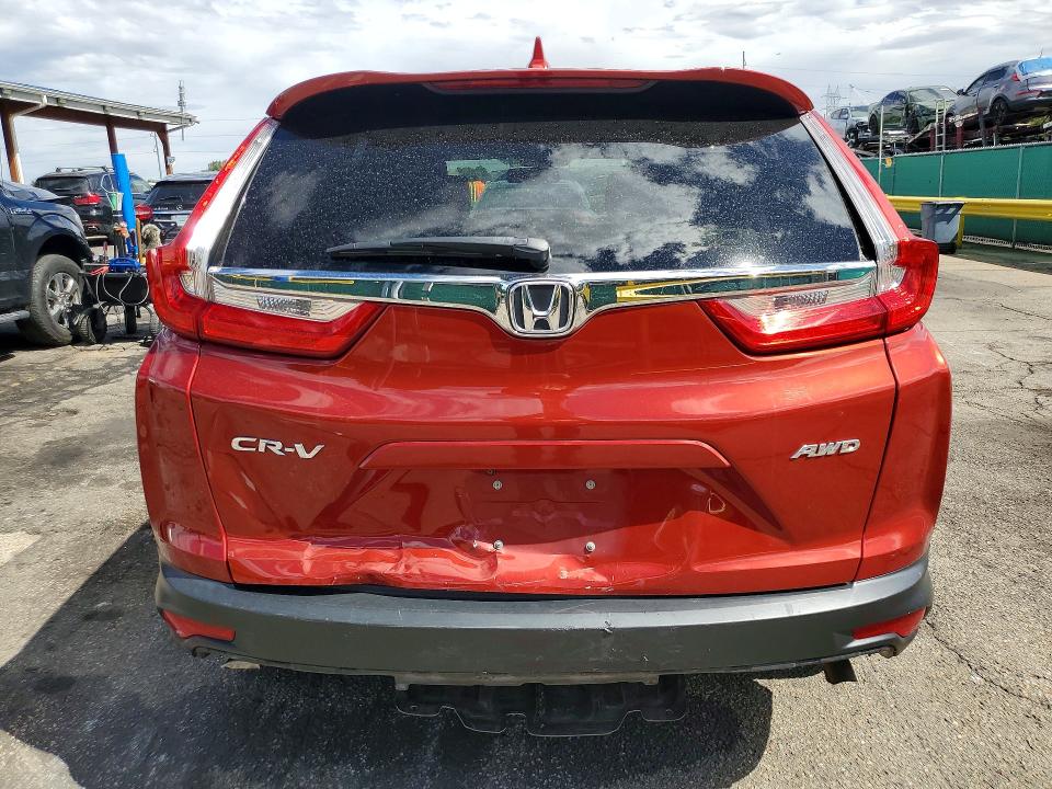 Photo 6 from auction – 2018 HONDA CR-V with VIN 2HKRW2H86JH678266