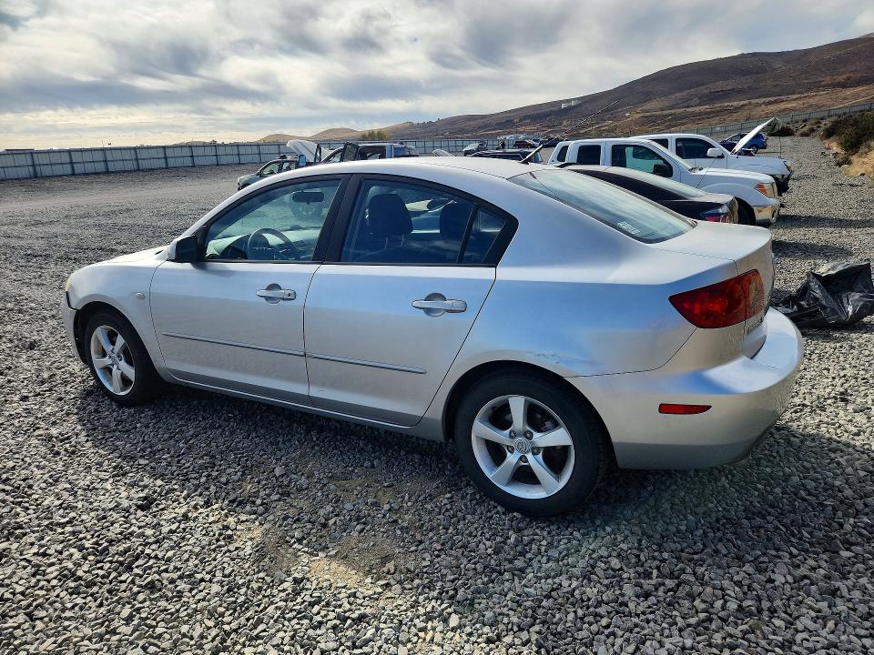 Снимка 2 от търг – 2006 MAZDA 3 с VIN JM1BK12F261423966