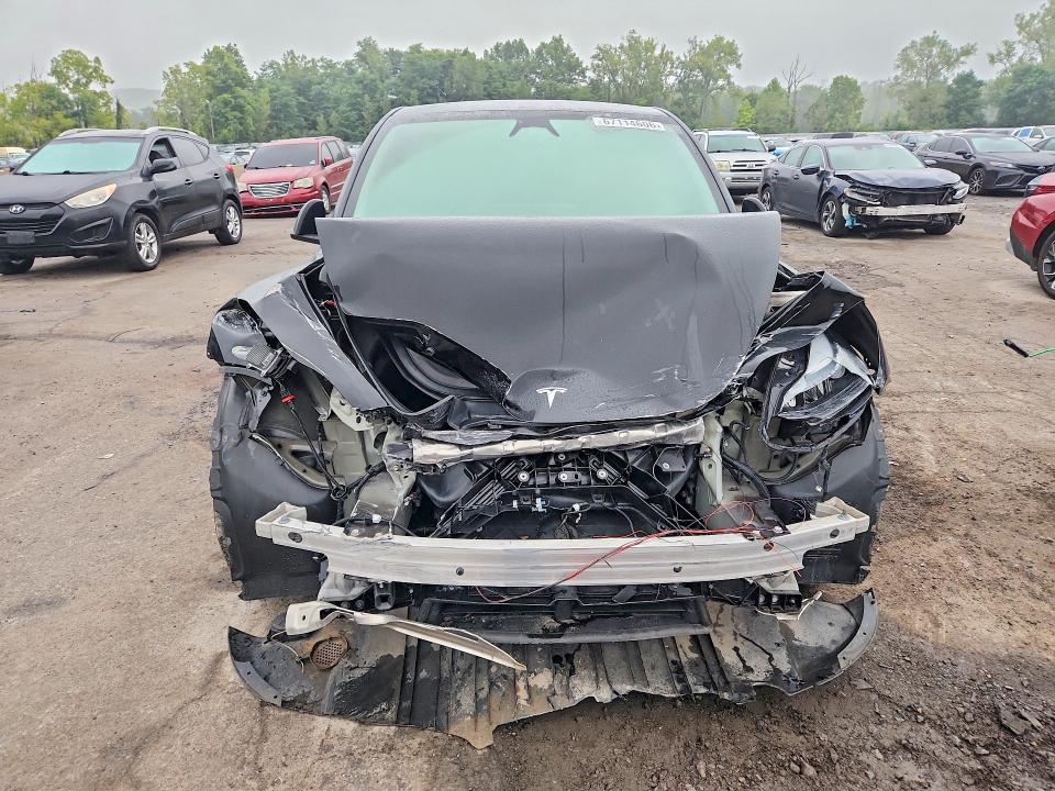 Photo 5 from auction – 2025 TESLA MODEL Y with VIN 7SAYGDEF1SA364788