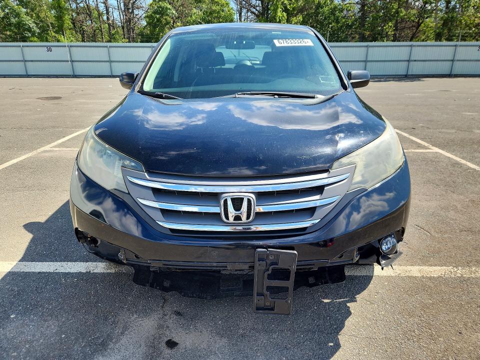 Photo 5 from auction – 2013 HONDA CR-V with VIN 2HKRM4H31DH606479