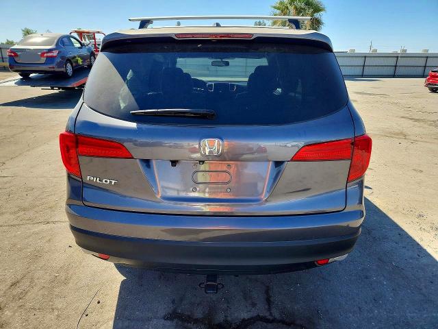 Снимка 6 от търг – 2018 HONDA PILOT с VIN 5FNYF5H50JB029385