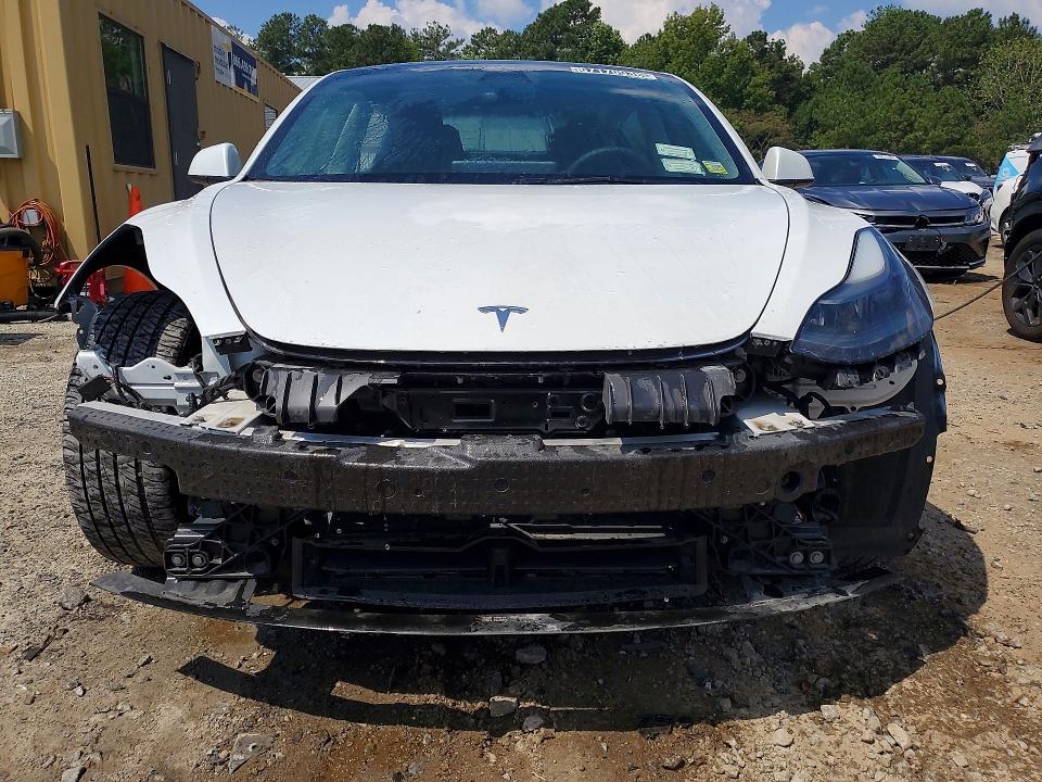Photo 5 from auction – 2022 TESLA MODEL 3 with VIN 5YJ3E1EA2NF368694