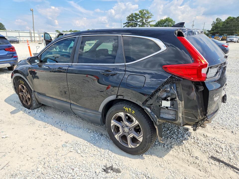 Photo 2 from auction – 2017 HONDA CR-V with VIN 7FARW1H58HE020395